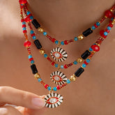 Evil eye charm necklace on model, spiritual and bold look